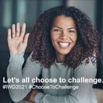 Image shows a woman holding up her hand with the text Let's all choose to challenge