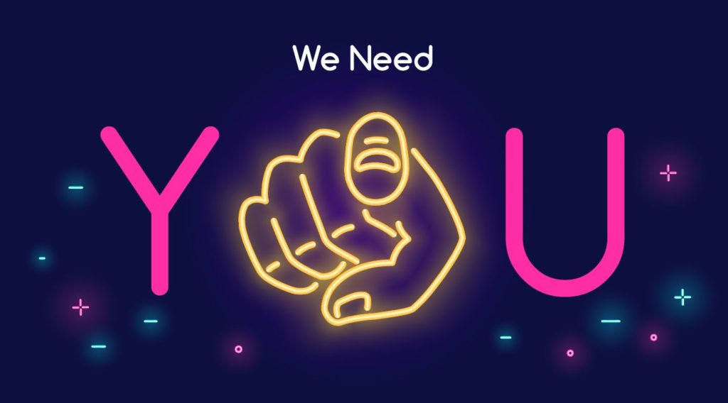 a blue back with with neon lights saying We need You. The O is depicted as a finger pointing to the reader