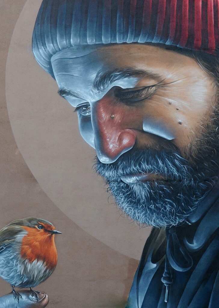 mural of St Mungo holding  a robin